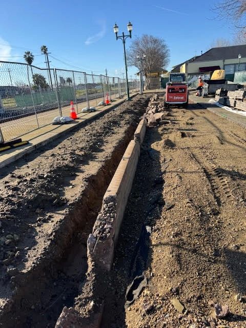 Curb line and trench excavation on a streetscape project